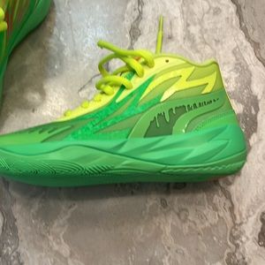 Brand new in box melo sneakers.